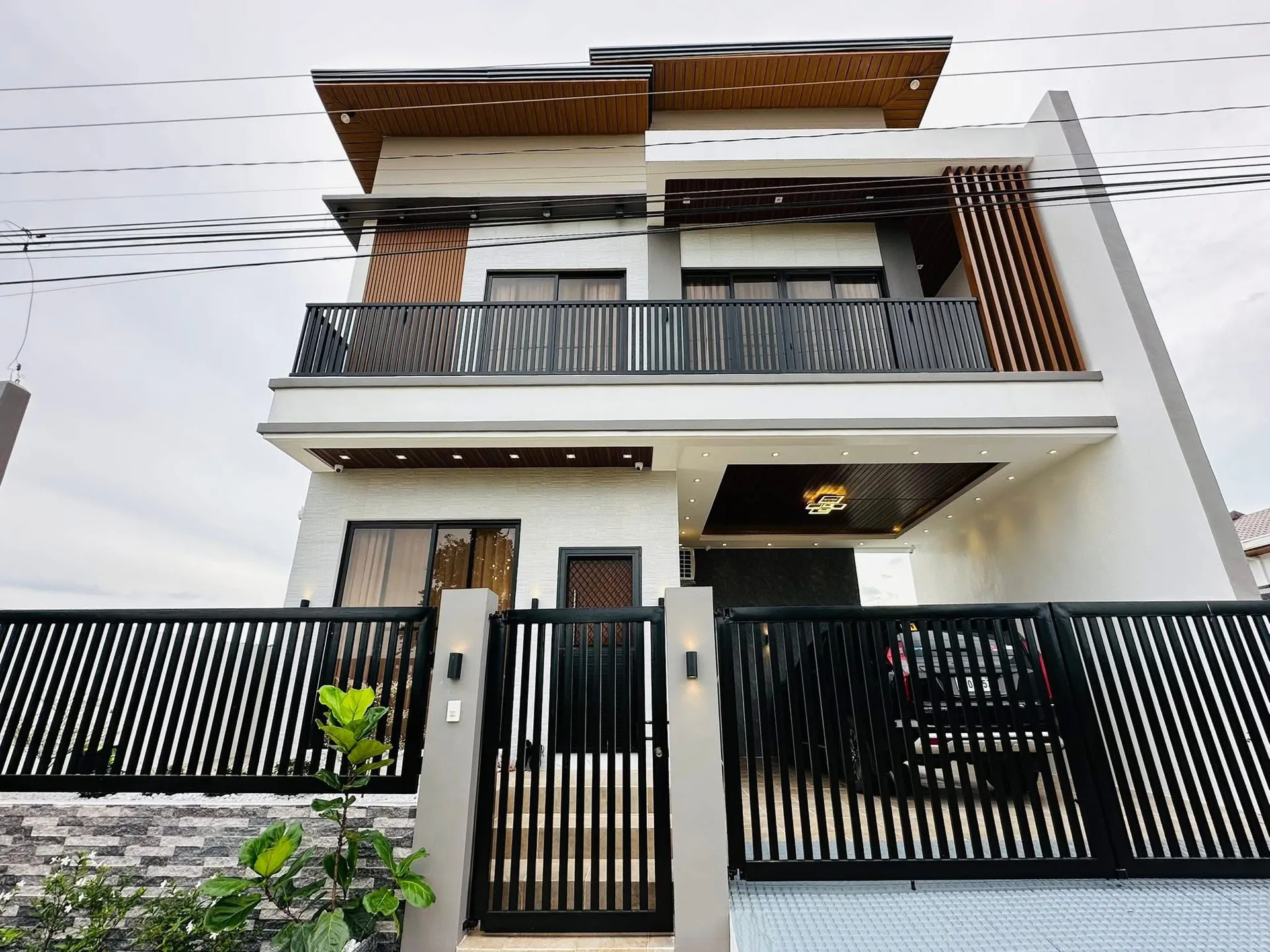 Finished residential exterior with modern facade and gate in Cagayan de Oro