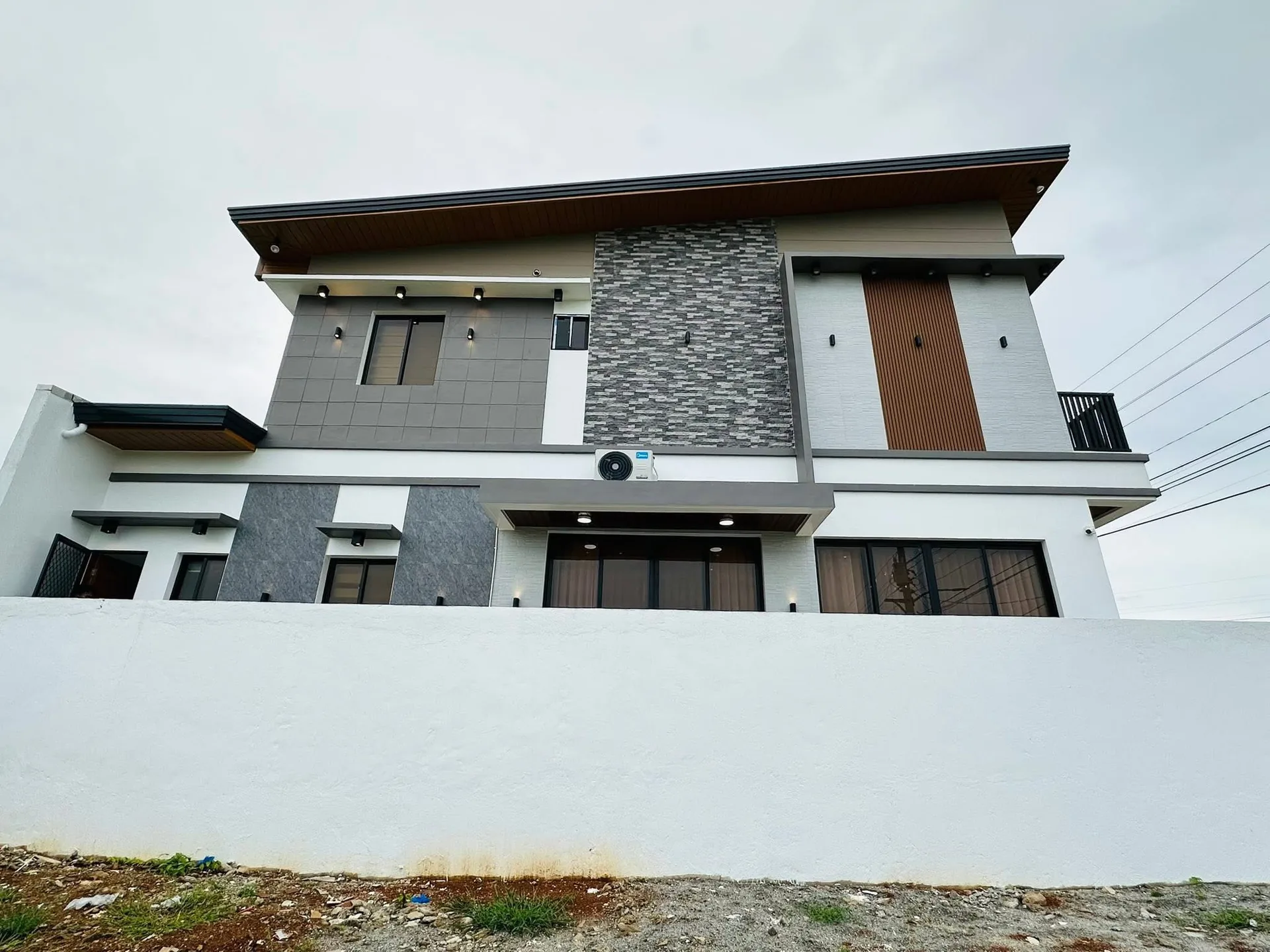 Low angle facade reference for a finished residence frontage